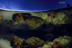 reflecting rocks....tide pool dream by Dale Kobetich 